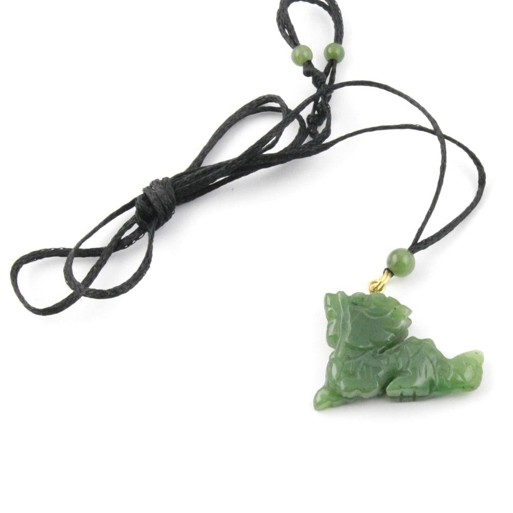 Green dragon pendant on a black cord necklace with green bead accents