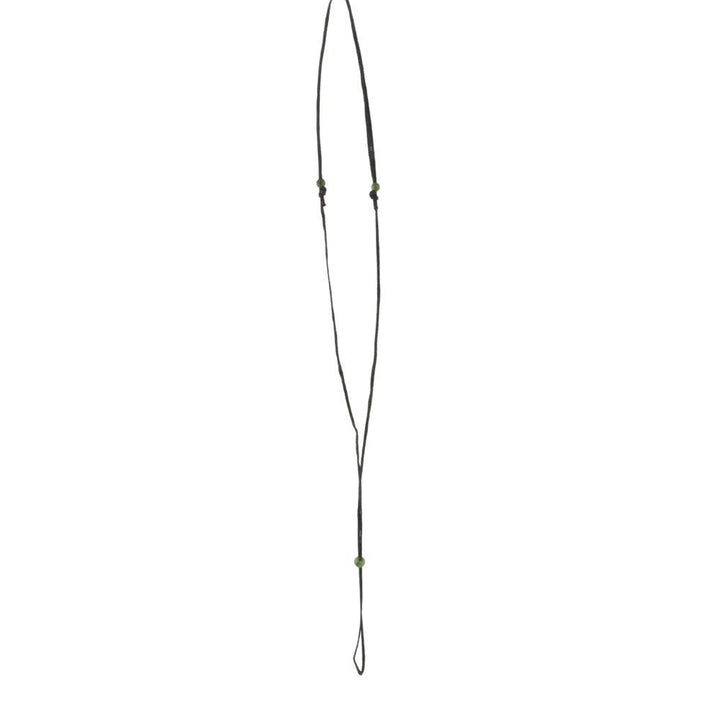 Long black wax cord necklace with green jade beads spaced along and a looped end