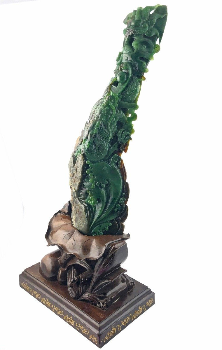 Jade dragon statue 12.5 inches tall with intricate carving on a decorative wooden pedestal