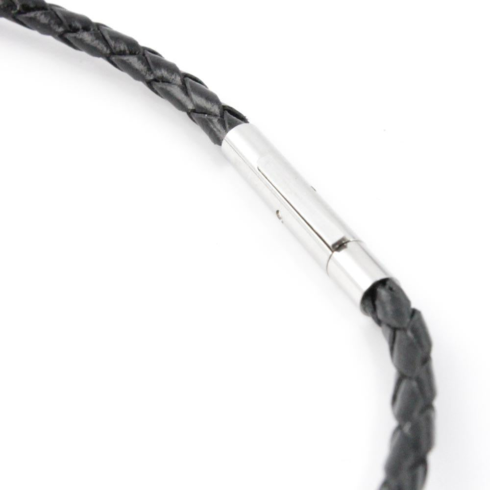 Black braided leather cord with a silver cylindrical clasp