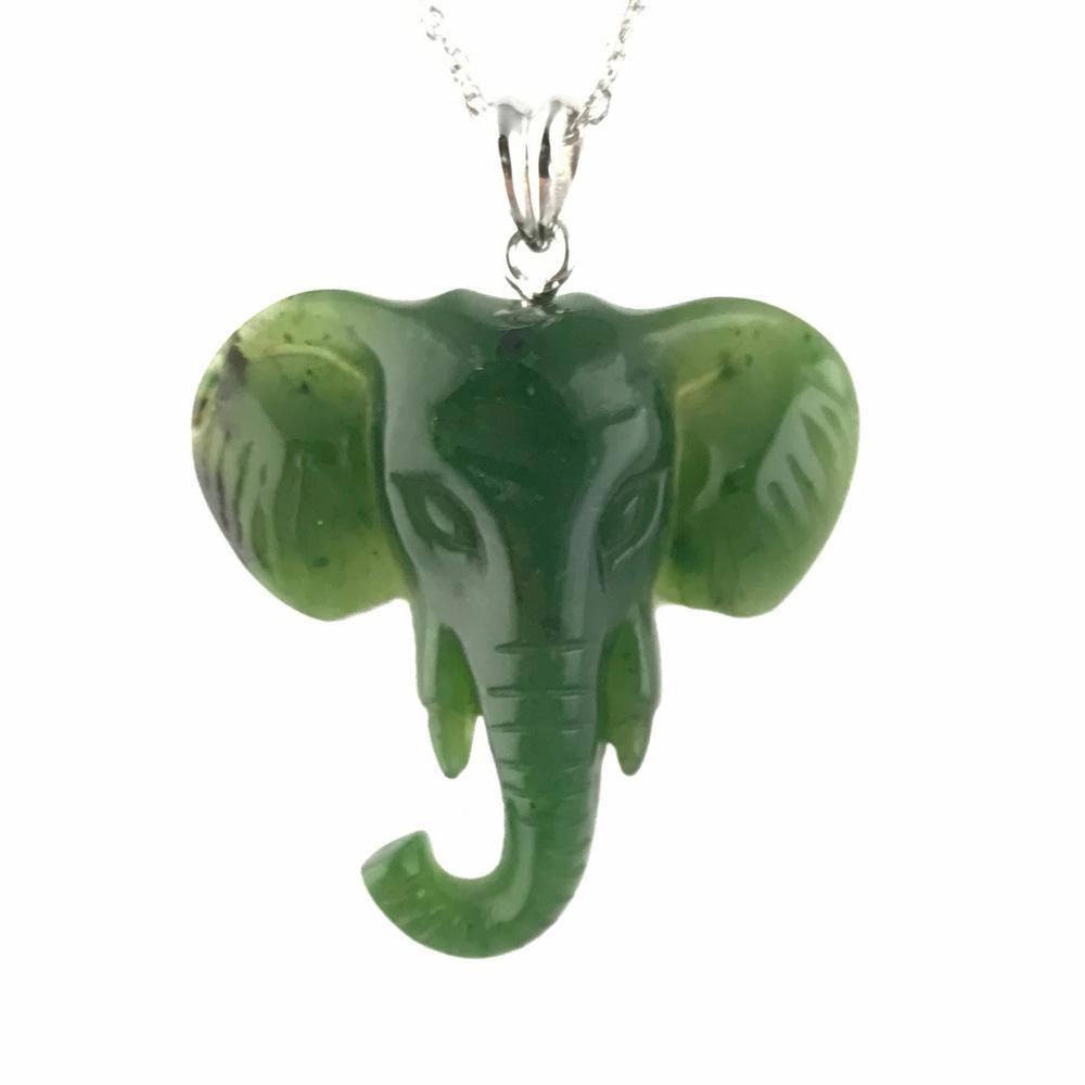Green elephant head pendant on a silver chain