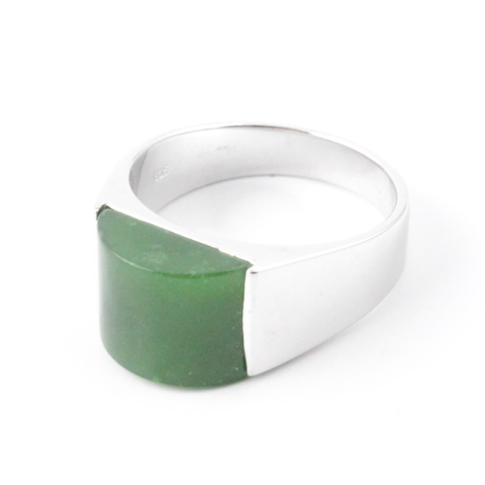 Wide silver ring with a green jade inlaid face
