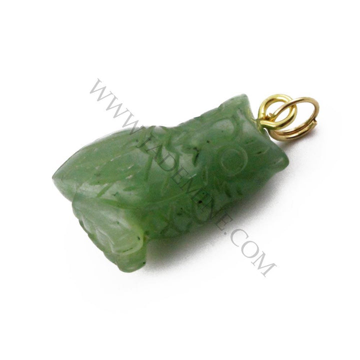 Green jade owl charm with a gold-tone ring loop, shown from a side angle