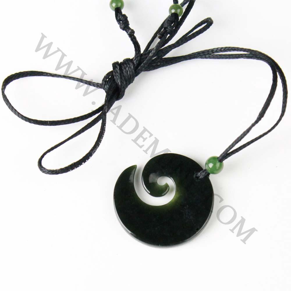 Dark Green/black jade spiral on a white background, with www.jademine.com watermarked on top