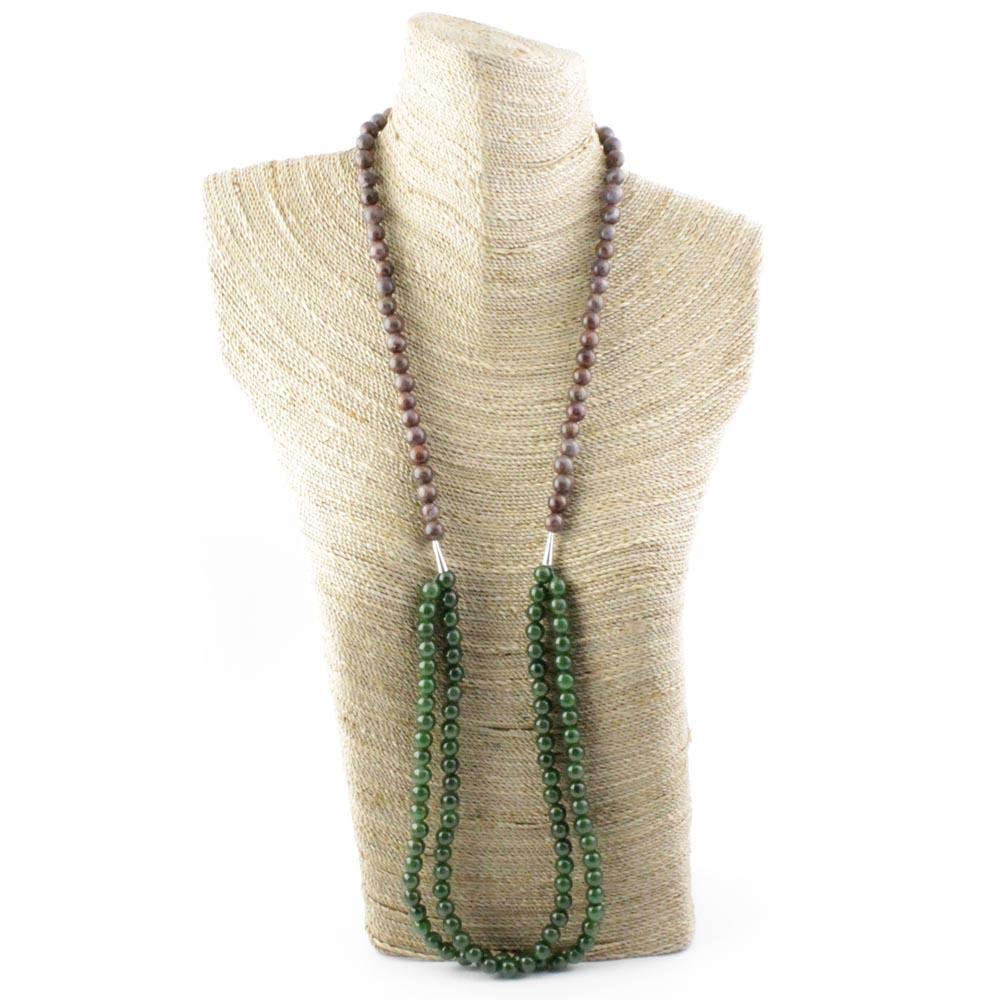 Jade bead and pietersite necklace on a white background with purple pietersite beads and green jade strands