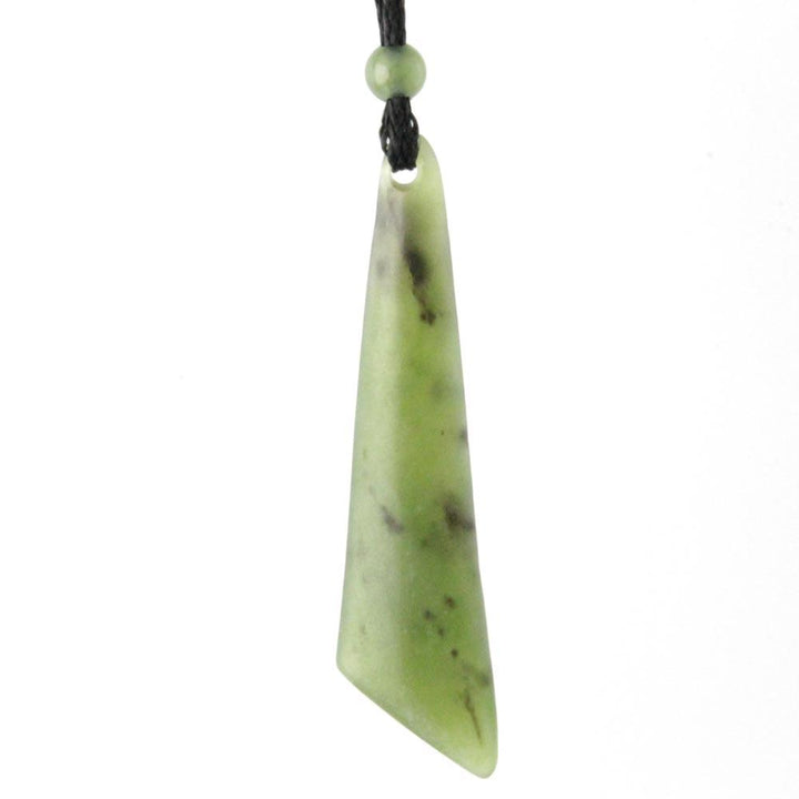 Pale green jade drop pendant with dark speckles and a top hole for the cord.