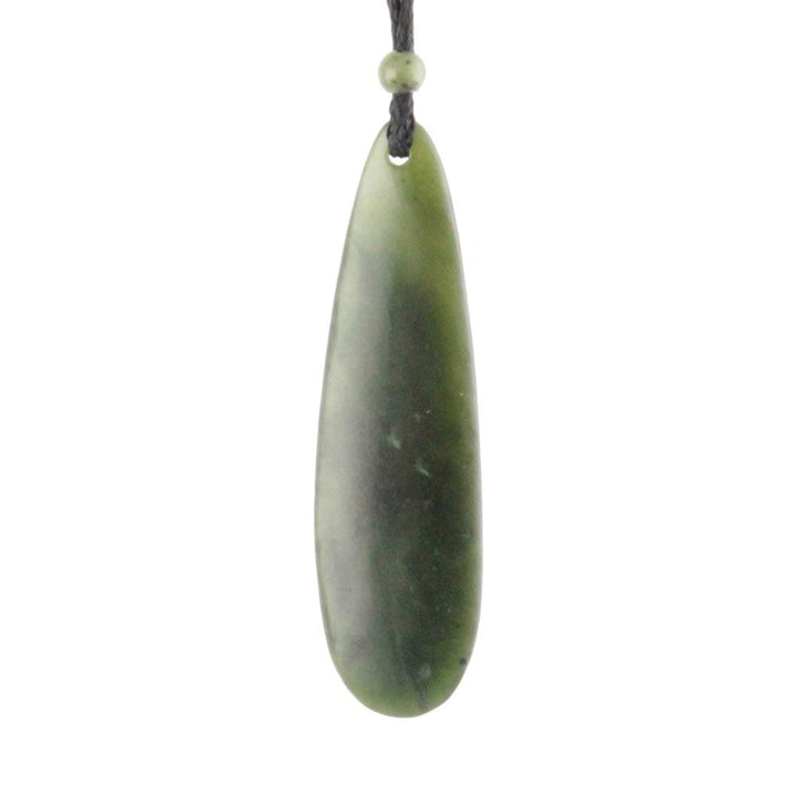 Single elongated jade teardrop pendant with color gradient on a dark cord