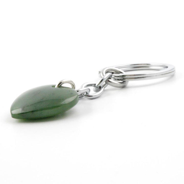 Green heart shaped keychain charm on a silver ring