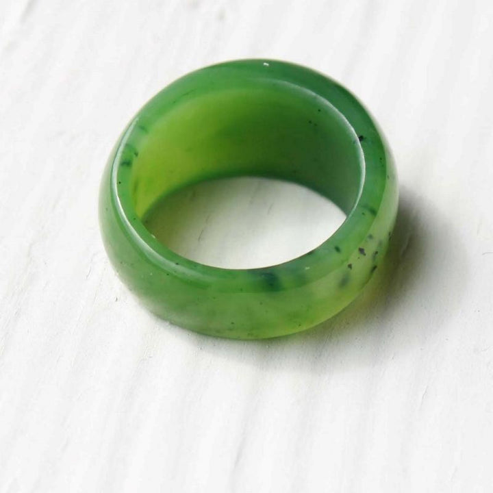 Green jade dome top band ring UJ-HNW-52 with smooth rounded profile on white background