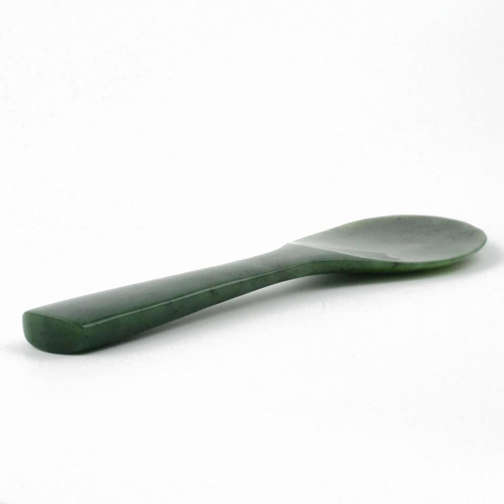Eight inch jade rice spoon with long handle and shallow rounded bowl