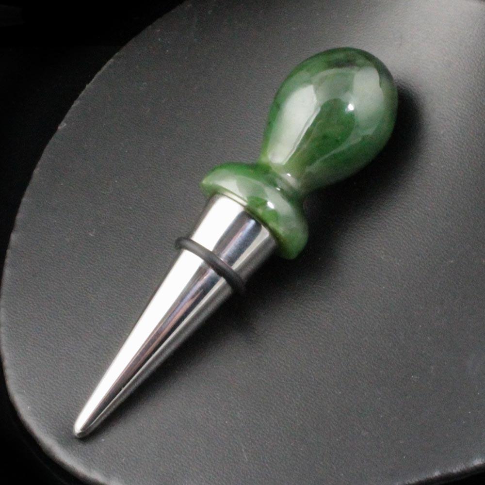 Green jade wine stopper with a silver tapered shaft