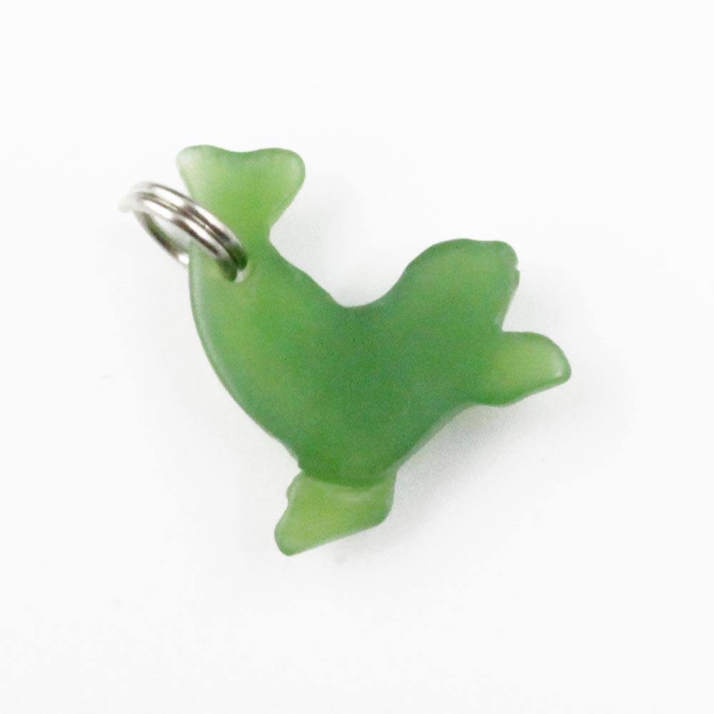 Green seal charm with a silver ring attached for hanging