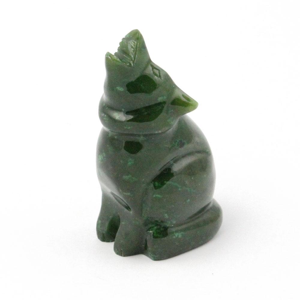 Green jade wolf, against white background