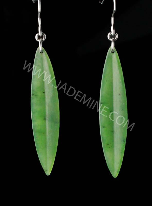 Pair of long green jade leaf earrings with silver hooks