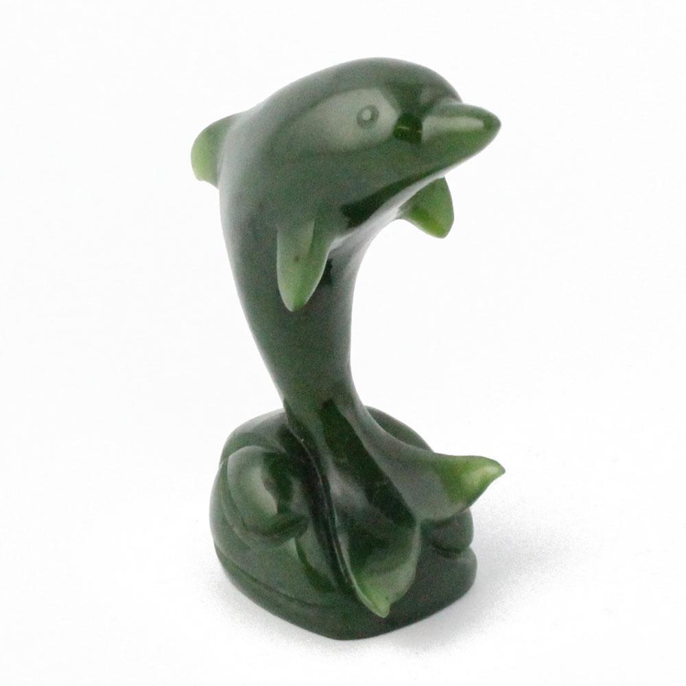 Dark green dolphin figurine with curved neck and small fins on a rounded base
