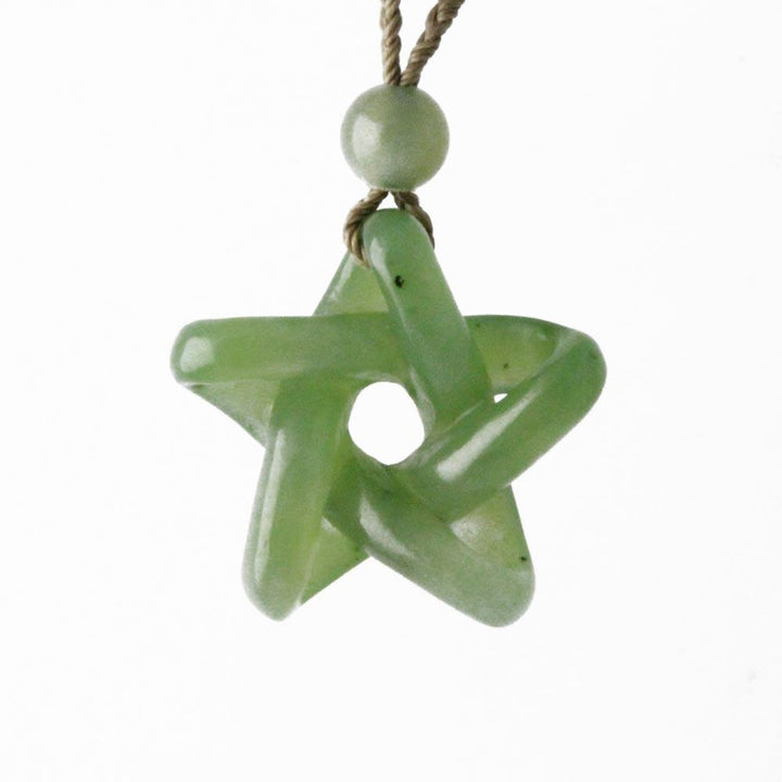 Pale green jade star pendant 25mm on a brown cord