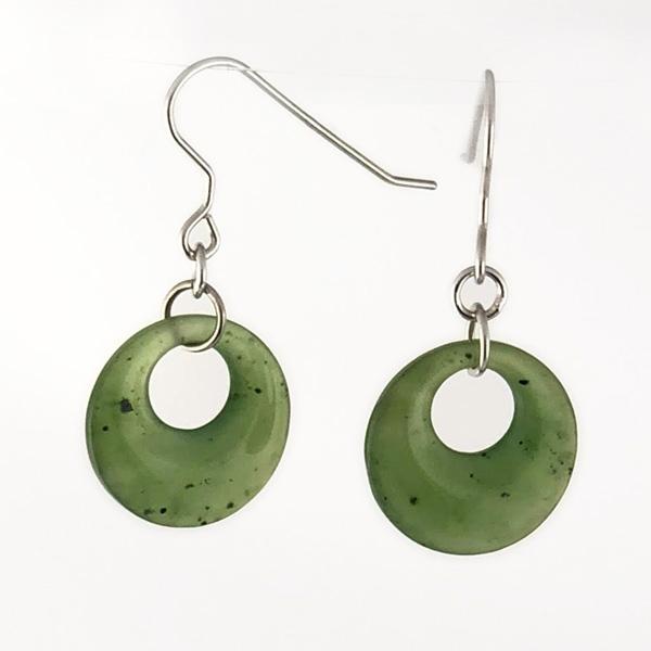 Pair of green circular jade hoop earrings with silver ear wires