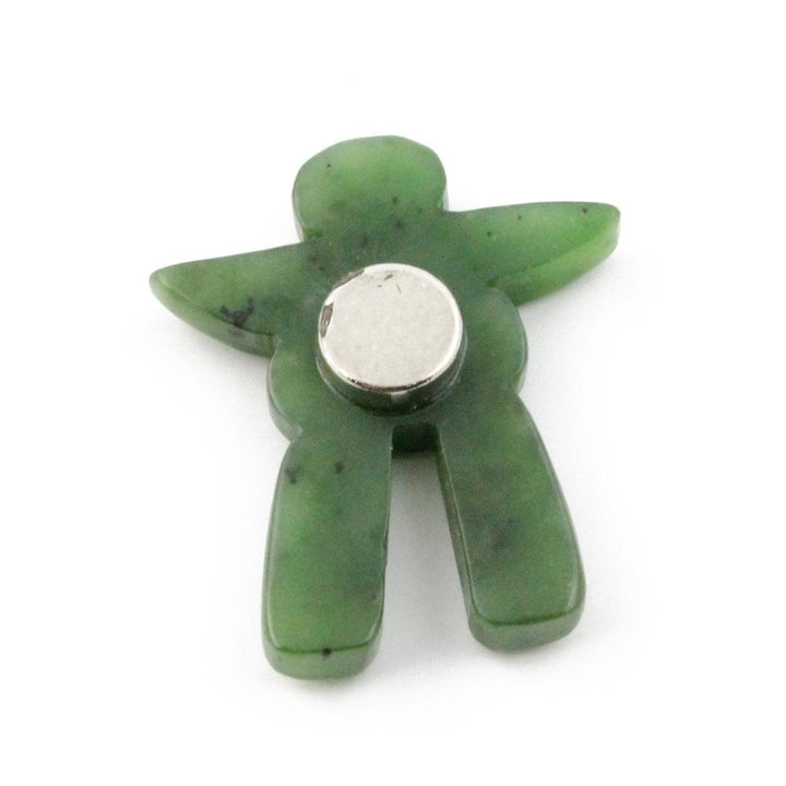 Green inukshuk magnet with silver circular backing.