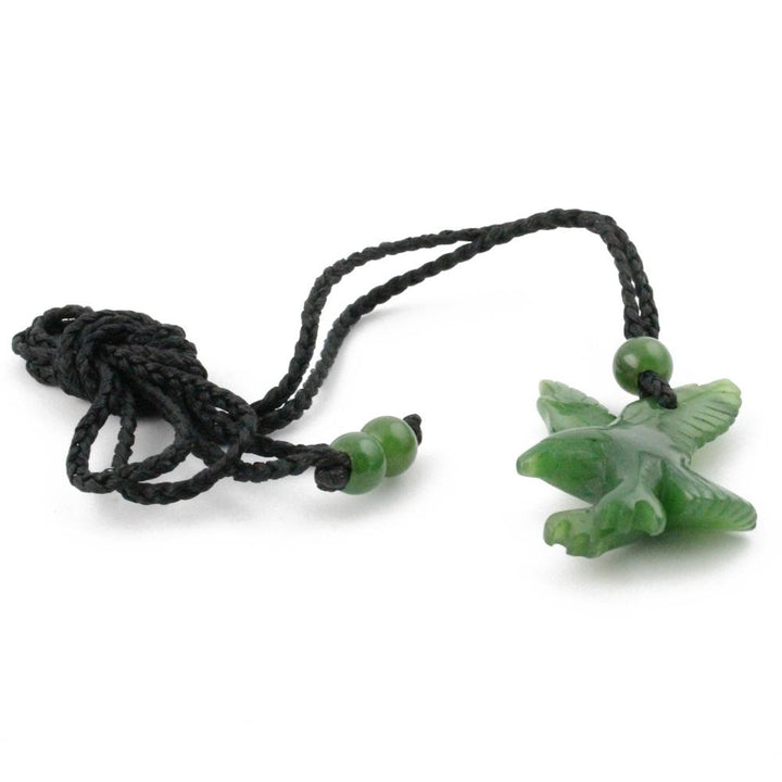 Jade eagle pendant on a braided black cord with green end beads