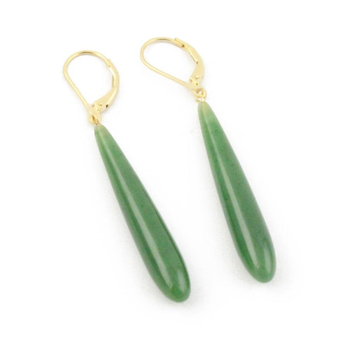 Long jade drop earrings with gold lever-back closures on white background.