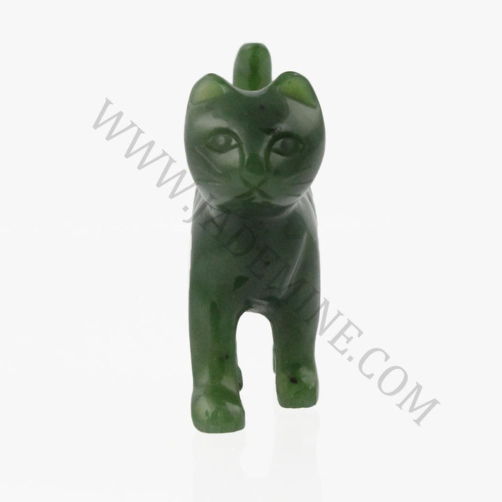 Green cat figurine facing forward with ears upright