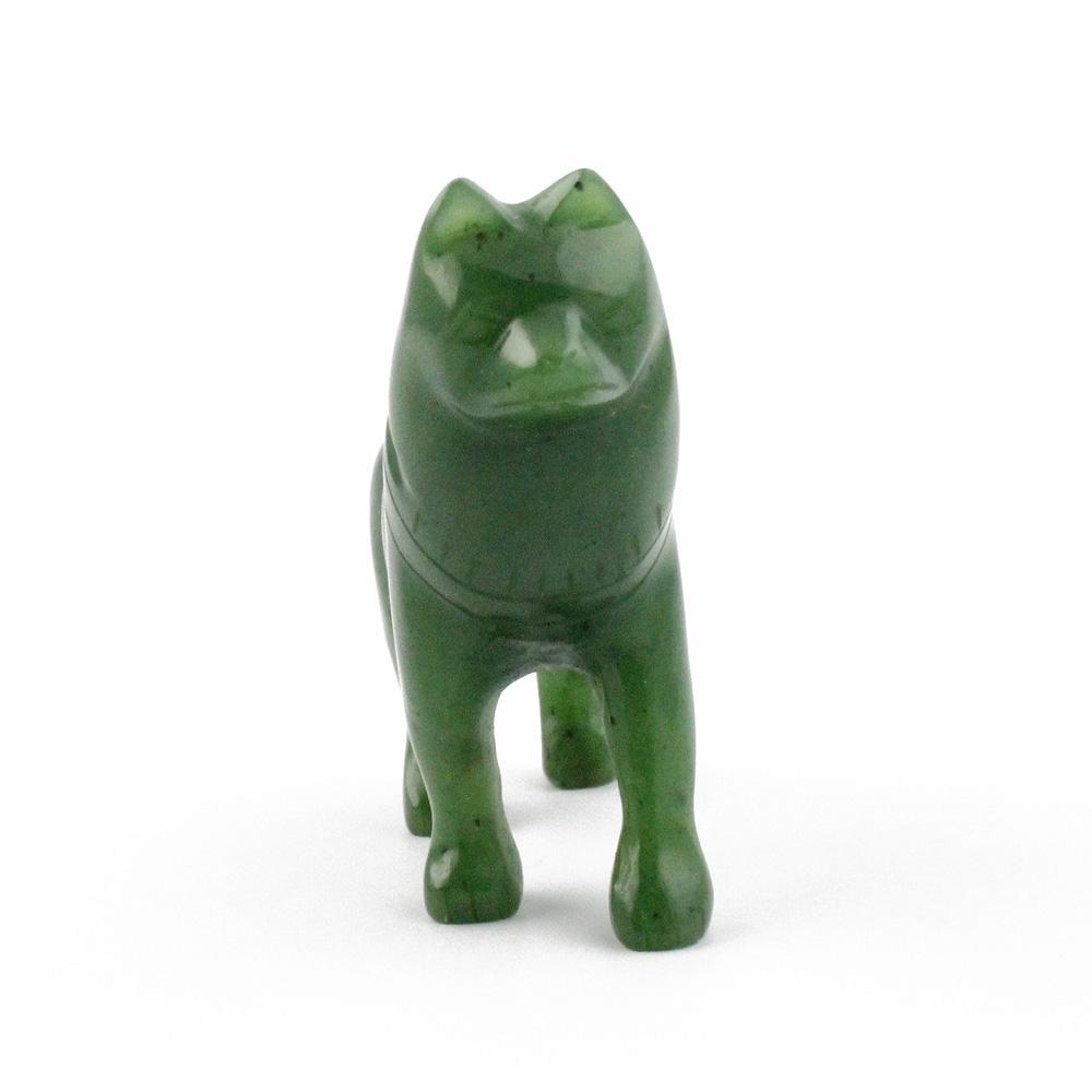Front view of a green jade husky sculpture standing.