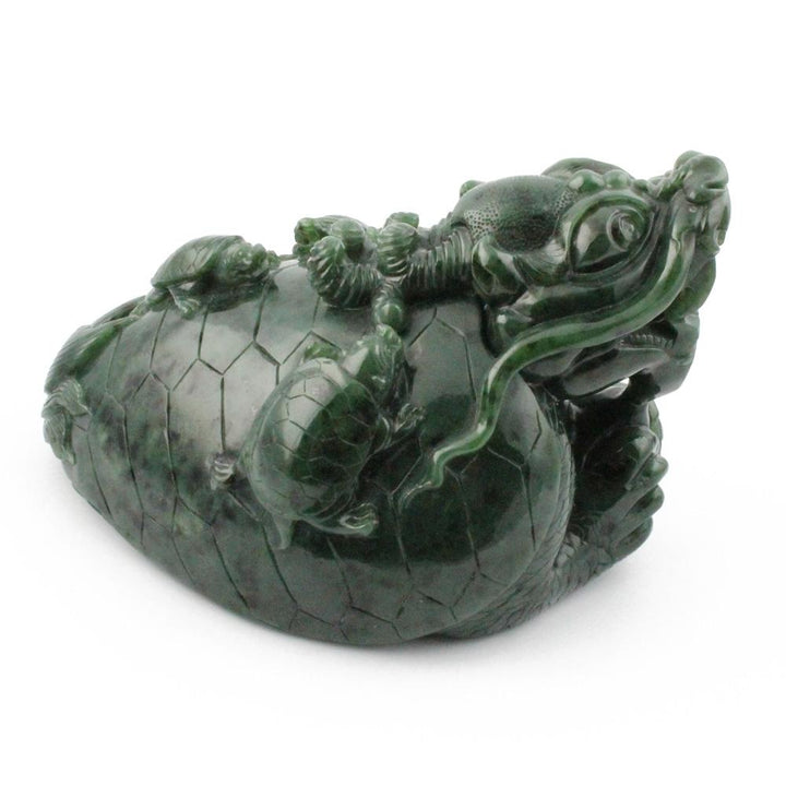 Side angle of jade dragon turtle highlighting the carved dragon and shell pattern