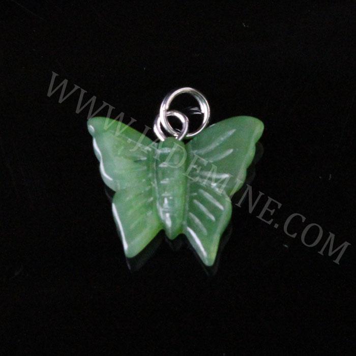 Green butterfly jade charm with a silver loop on black background