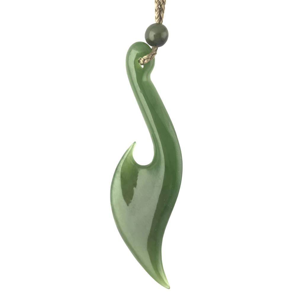 Green jade fish hook pendant on a beige braided cord with a small round bead