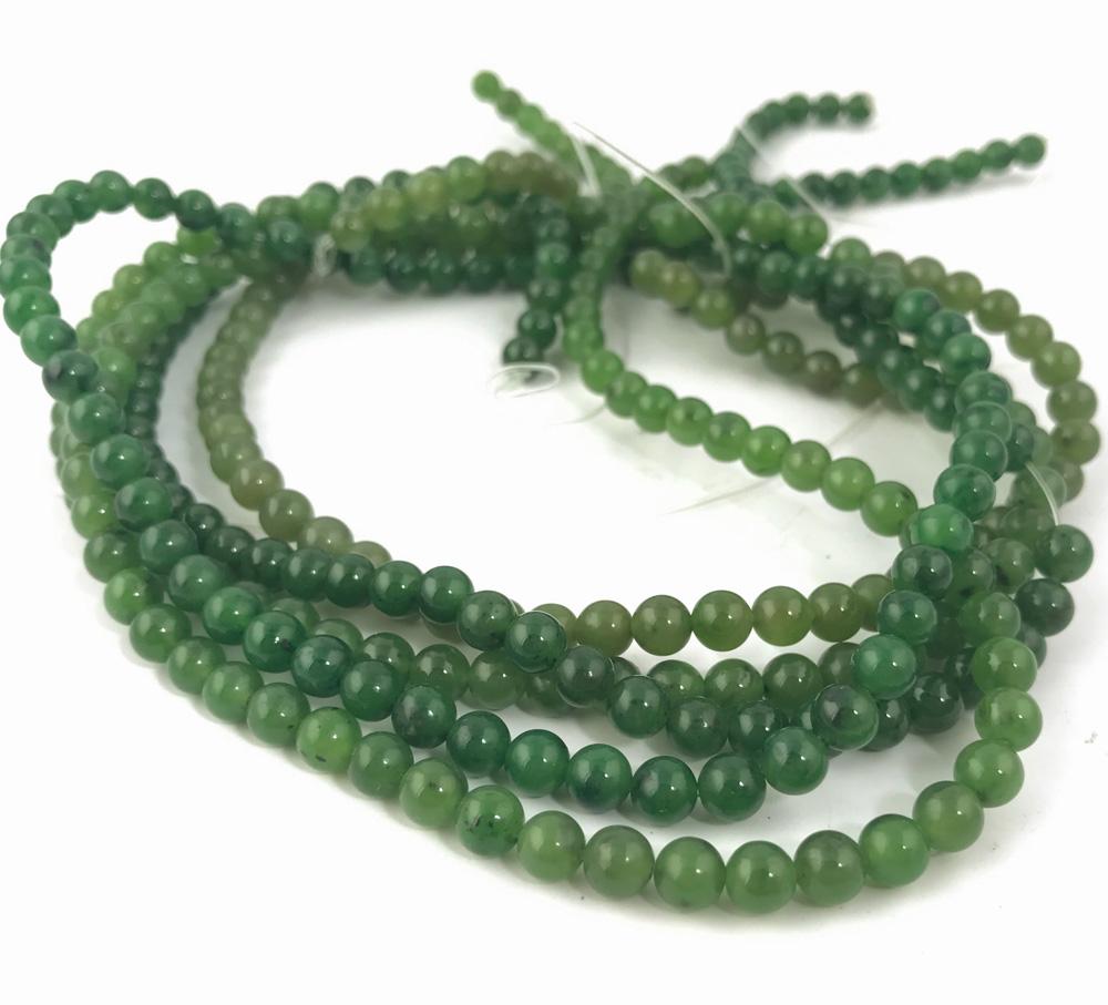 Green 6mm round beads on multiple unstrung strands