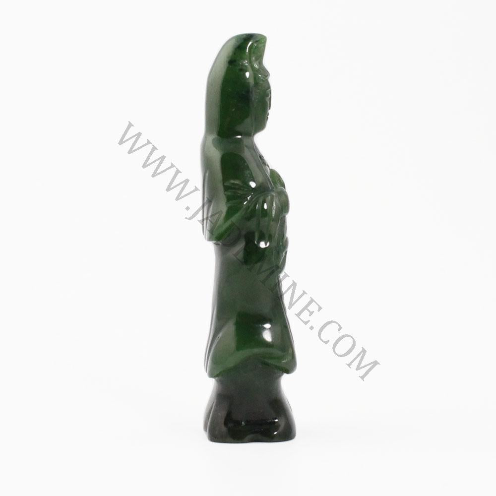 Green jade Guanyin standing statue with flowing robes.