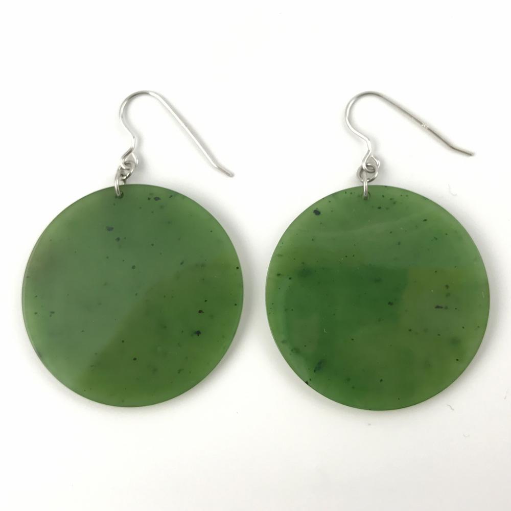 Pair of green circular disc earrings with silver hooks