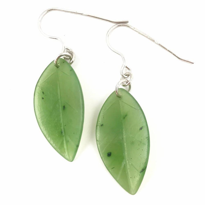 Green jade leaf shaped drop earrings with silver ear wires