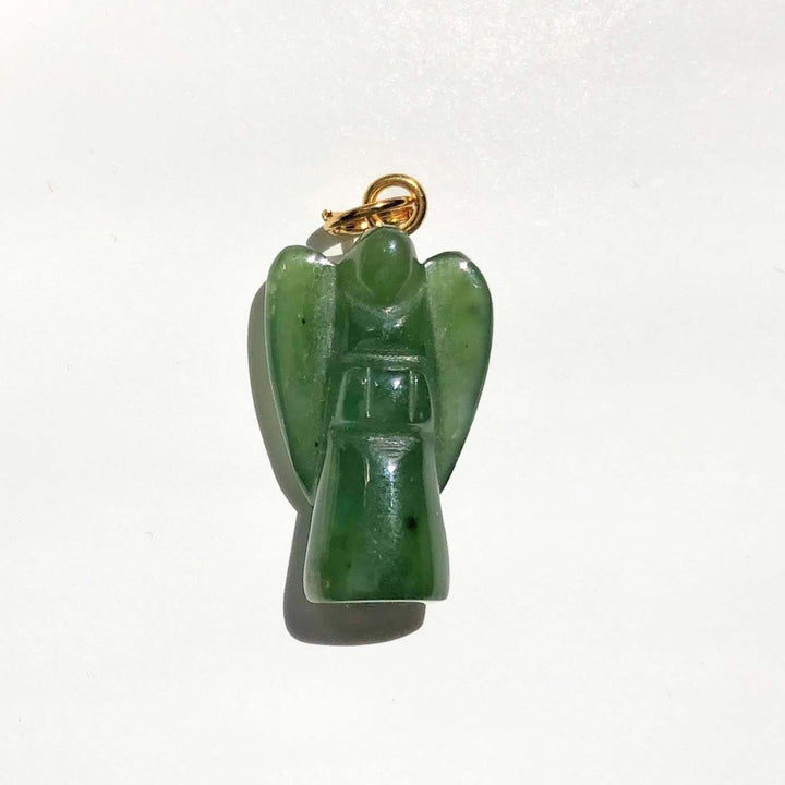 Green angel charm pendant carved from jade with a gold bail