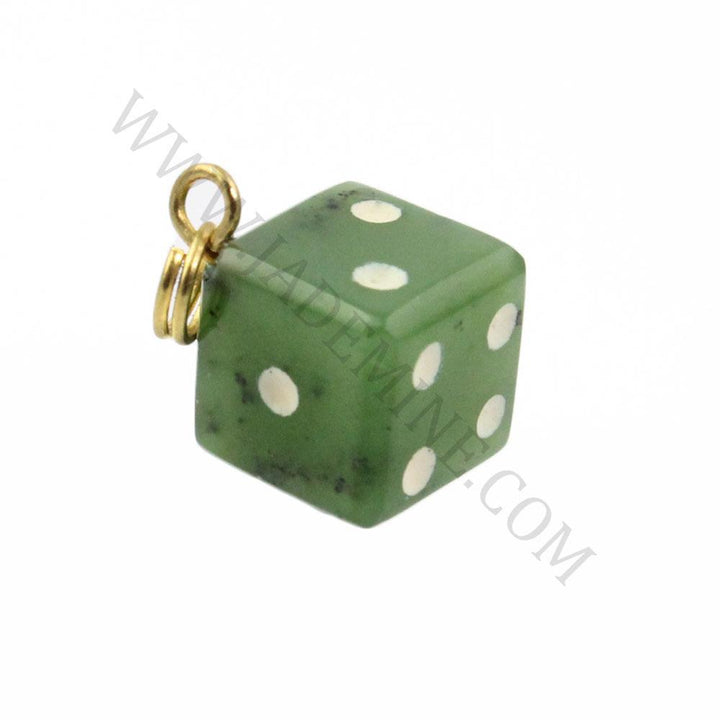 Green jade dice charm with white pips and a gold ring attachment.