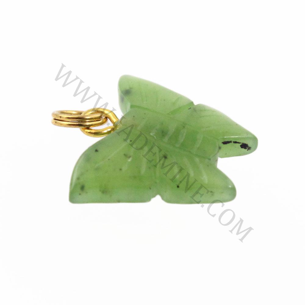 Green jade butterfly charm with a gold ring bail viewed from the side