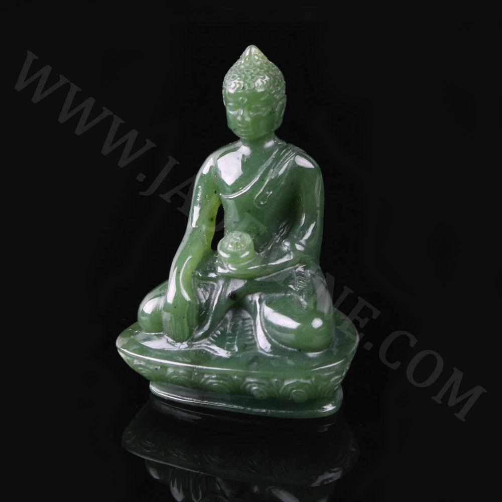 Green jade Buddha statue in a three quarter view seated in meditation with robe over the left shoulder on a decorative base