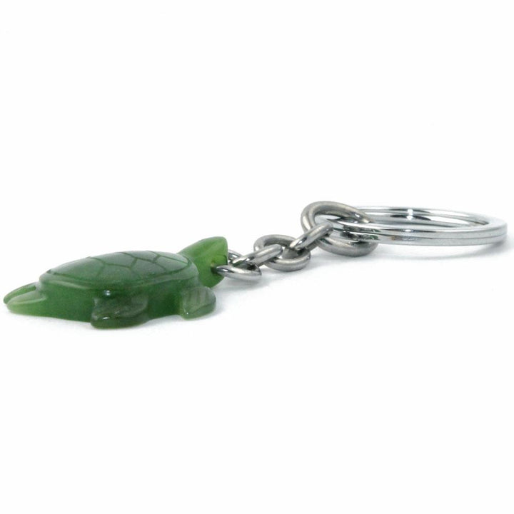 Green turtle keychain charm attached to a silver ring